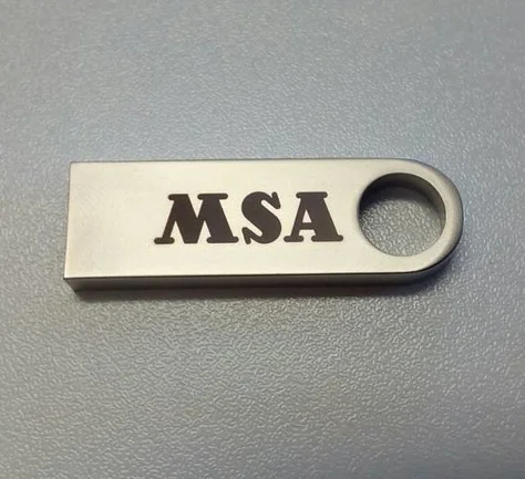 Ukázka tmavého laserového gravírování na USB-MK1 (potisk laserem) - Ukázka tmavého gravírování loga MSA (potisku laserem) na oblíbený model MK1.  Ob...